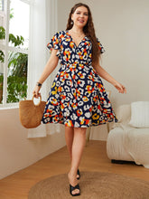 Robe léopard grande taille à col surplis et manches flottantes